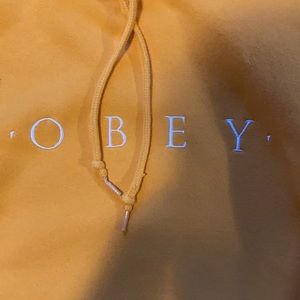 Yellow men’s obey hoodie embroidered